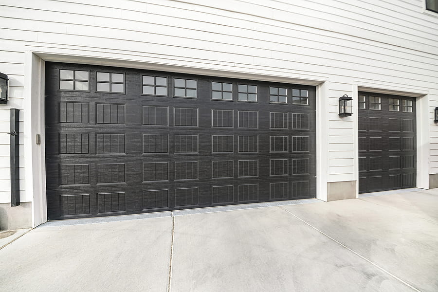 A modern black garage door in Chicago